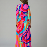 Celeste™ | Vestido midi floral com decote cruzado e manga a três quartos