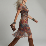 Amélia™ | Vestido midi com decote halter, bainha assimétrica e abertura lateral