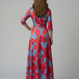 Celeste™ | Vestido midi floral com decote cruzado e manga a três quartos
