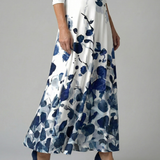 Celeste™ | Vestido midi floral com decote cruzado e manga a três quartos