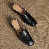 Mules em couro Almira