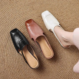 Mules em couro Almira