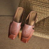 Mules em couro Almira