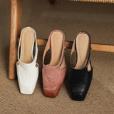 Mules em couro Almira