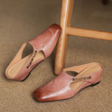 Mules em couro Almira