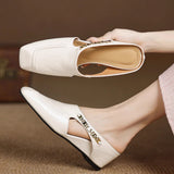 Mules em couro Almira