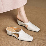 Mules em couro Almira