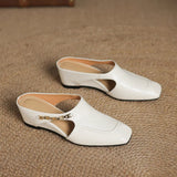 Mules em couro Almira