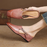 Mules em couro Almira