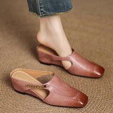 Mules em couro Almira
