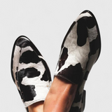 Mocassins Mafalda elegantes com salto baixo e padrão animal