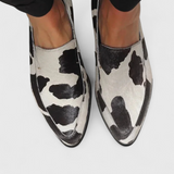 Mocassins Mafalda elegantes com salto baixo e padrão animal
